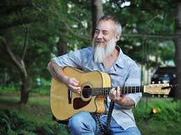 Frank Critelli, Host, with guitar