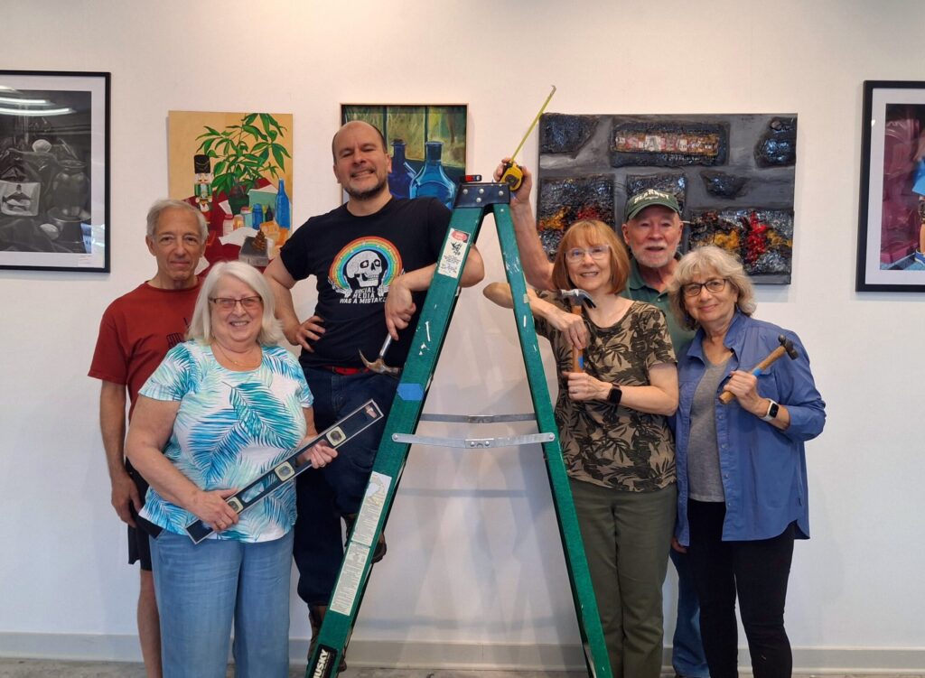 Six folks on a ladder